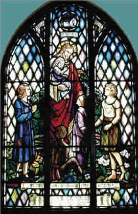 Medium sized image of the baptistry stained glass window at St. Michael's Church